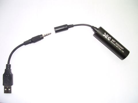 USB audio adapter dongle plugged into a laptop for sound output USB audio adapter dongle plugged into a laptop for sound output