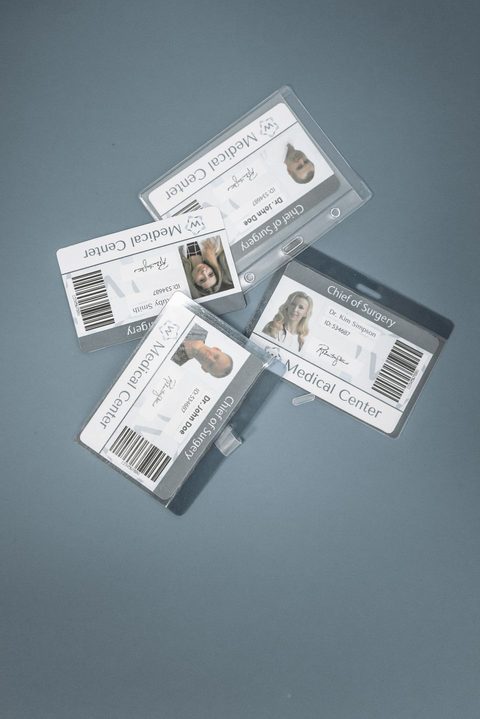 Stack of finished laminated identification cards produced with a thermal laminator Stack of finished laminated identification cards produced with a thermal laminator