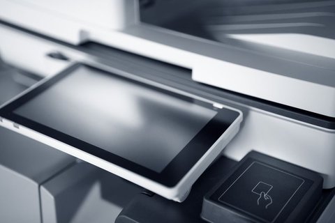 Close up of a printer touchscreen control panel used to check Wi-Fi status before installing drivers Close up of a printer touchscreen control panel used to check Wi-Fi status before installing drivers
